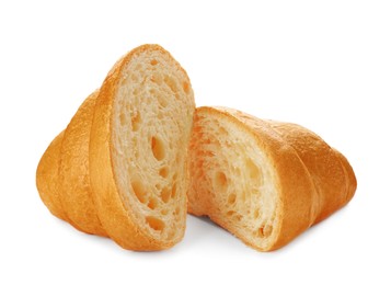 Photo of Delicious cut croissant isolated on white. Freshly baked pastry