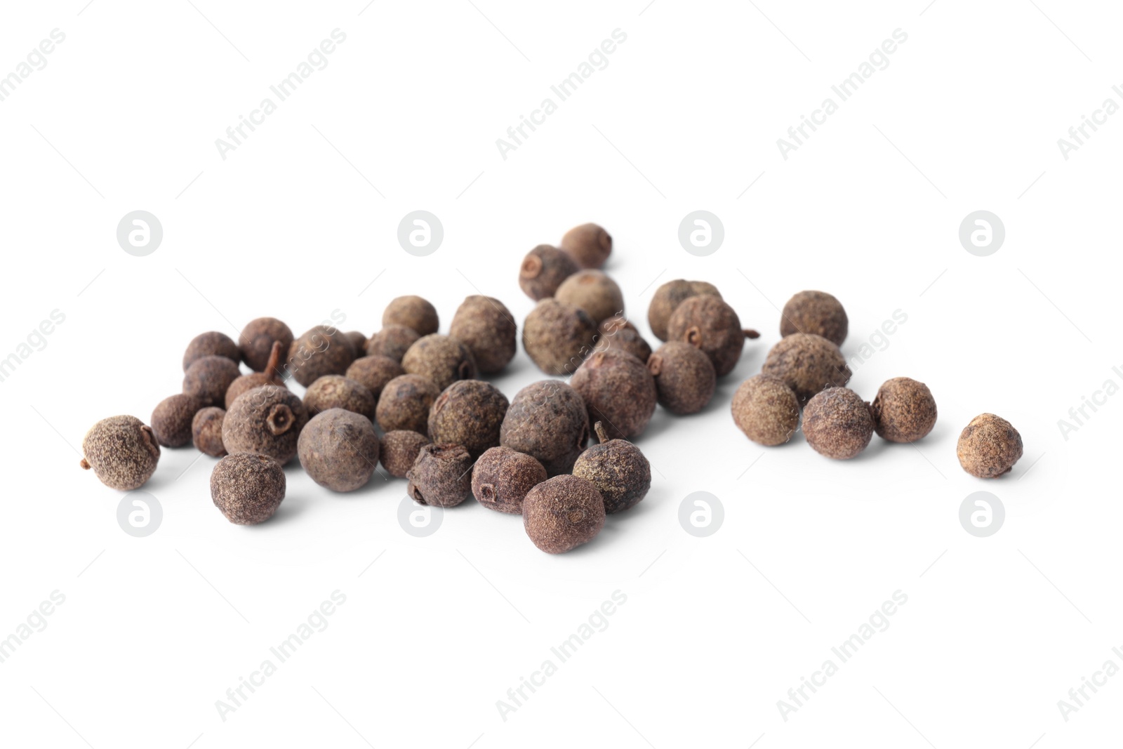 Photo of Spicy black pepper grains isolated on white