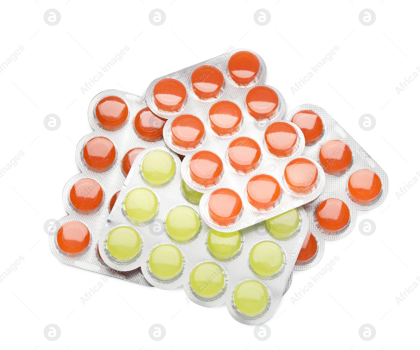 Photo of Blisters with colorful cough drops on white background, top view