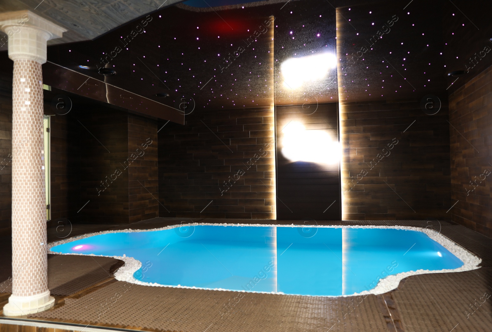 Photo of Interior of spa center with indoor pool