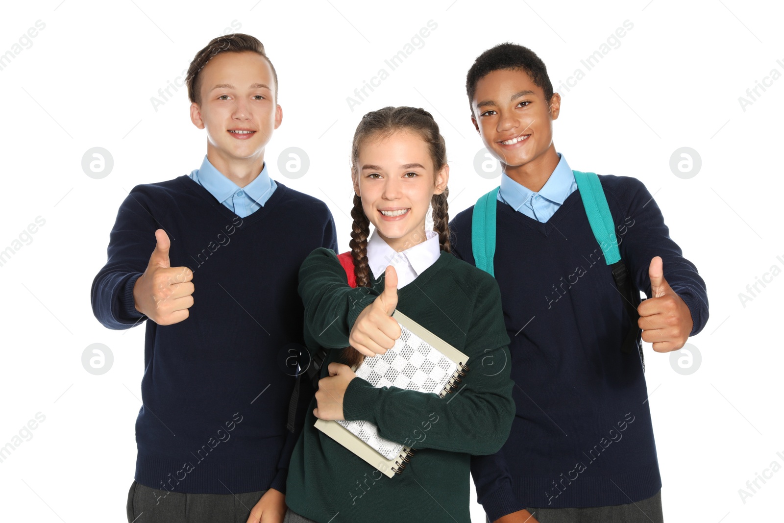 Photo of Teenagers in stylish school uniform on white background