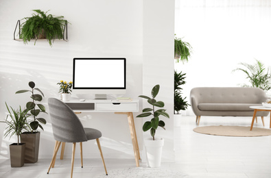 Image of Home workplace with modern computer and desk in room. Mockup for design