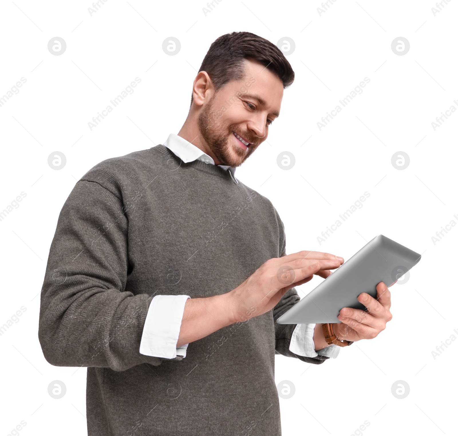 Photo of Handsome bearded businessman using tablet on white background, low angle view