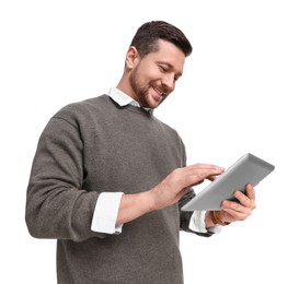 Handsome bearded businessman using tablet on white background, low angle view