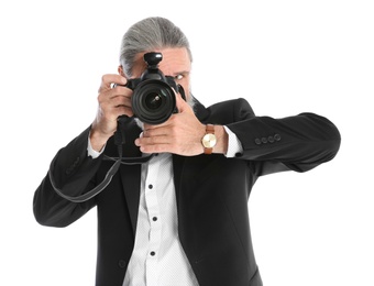 Photo of Male photographer with professional camera on white background