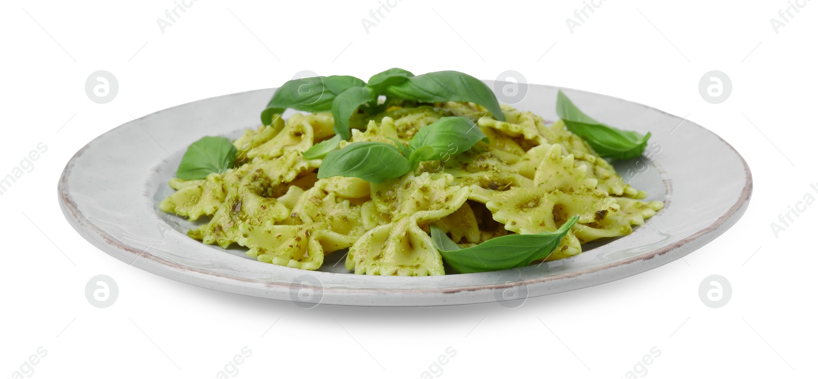 Photo of Delicious pasta with pesto sauce and basil isolated on white