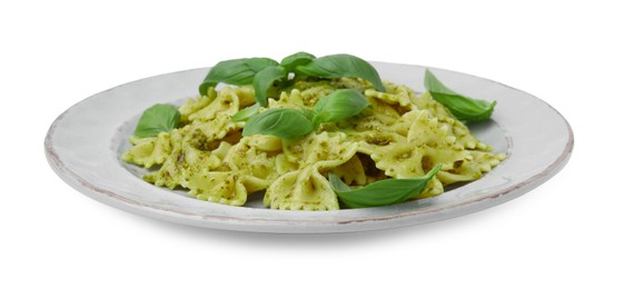 Delicious pasta with pesto sauce and basil isolated on white