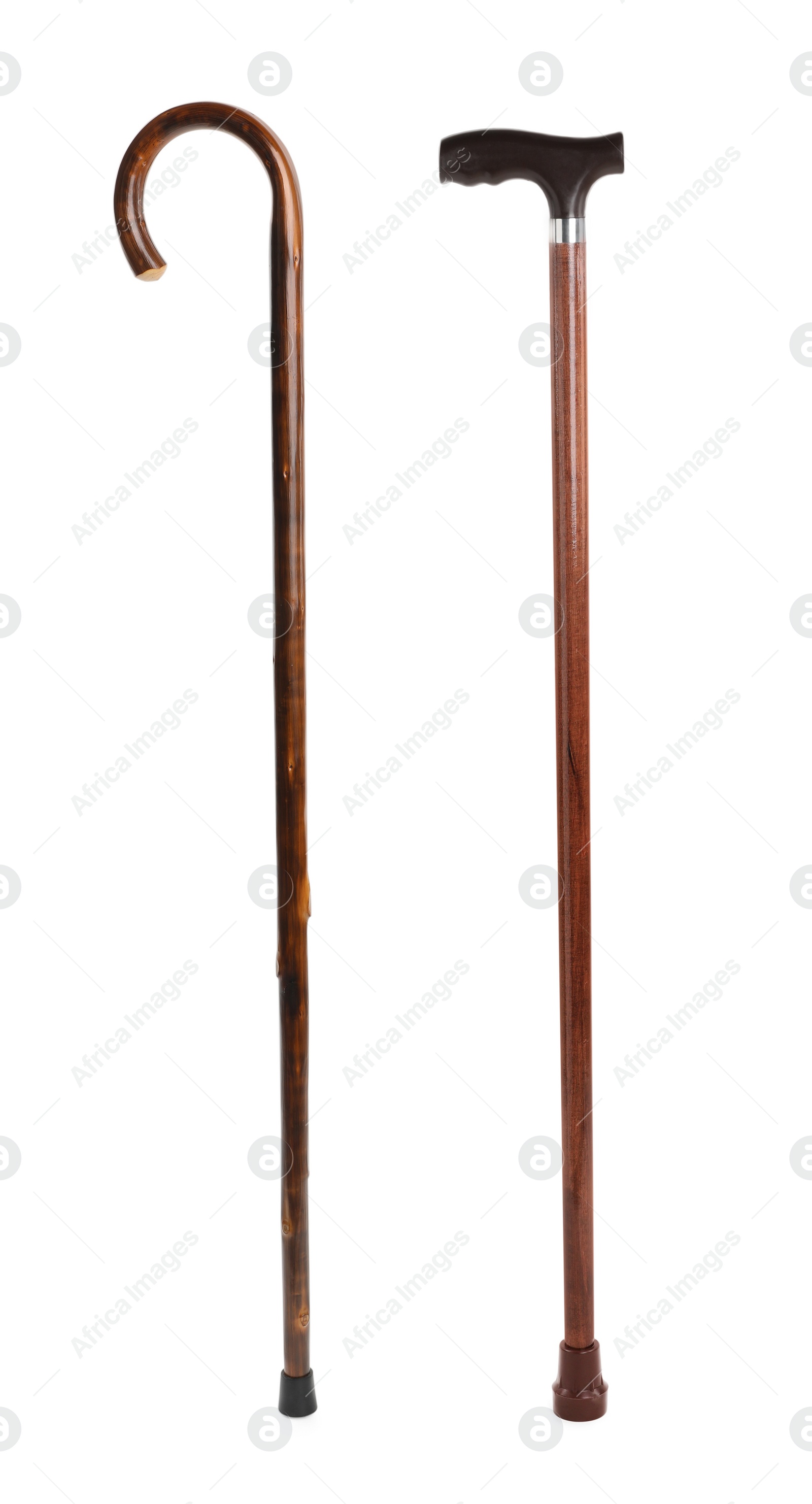 Image of Elegant wooden walking canes on white background