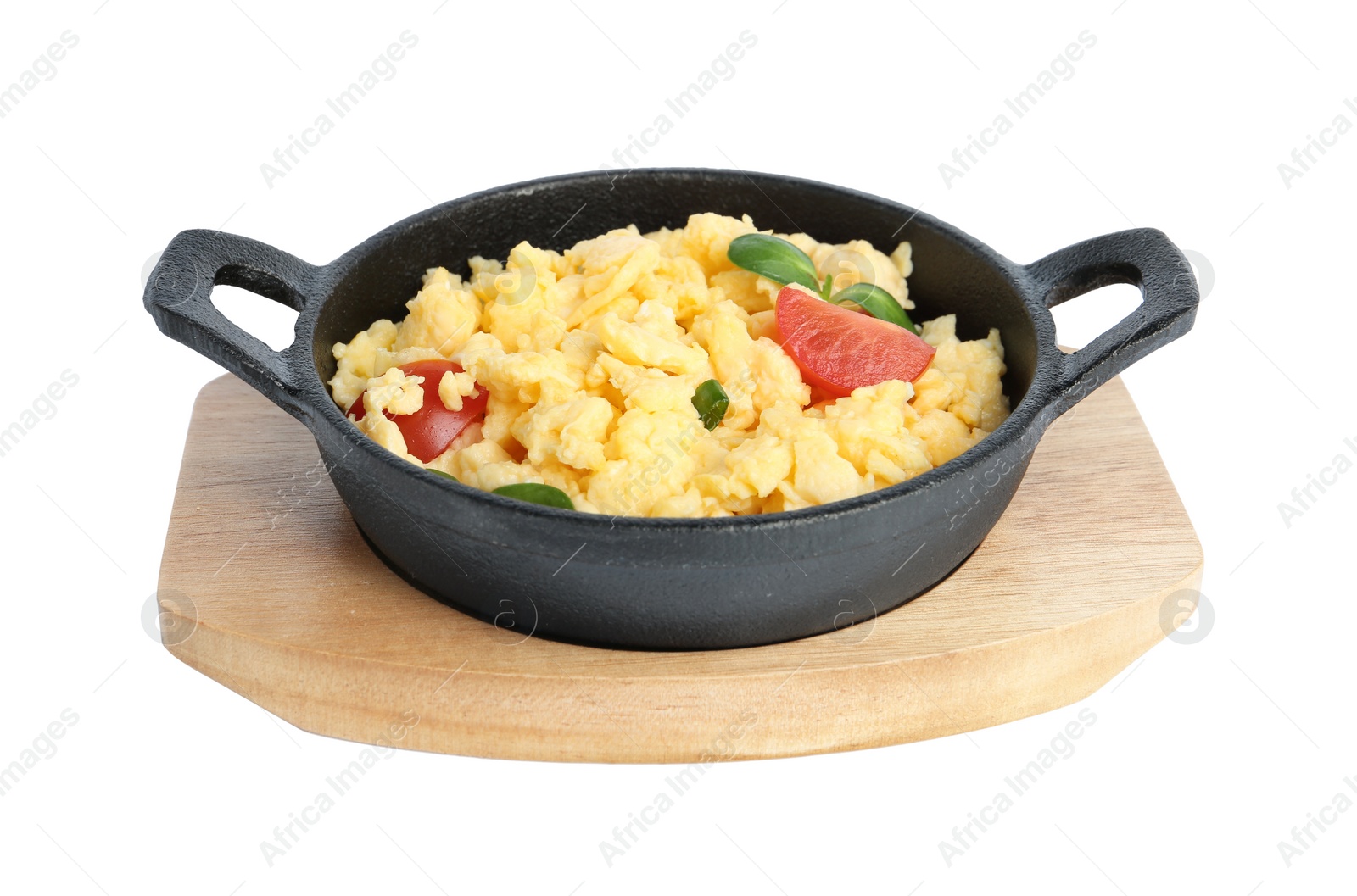 Photo of Tasty scrambled eggs with sprouts and cherry tomato in frying pan isolated on white