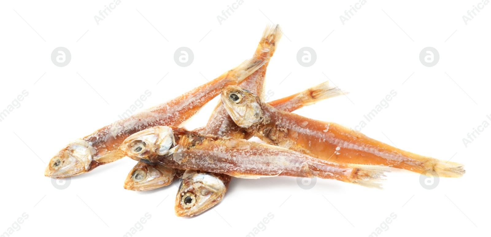 Photo of Delicious dried salted anchovies on white background