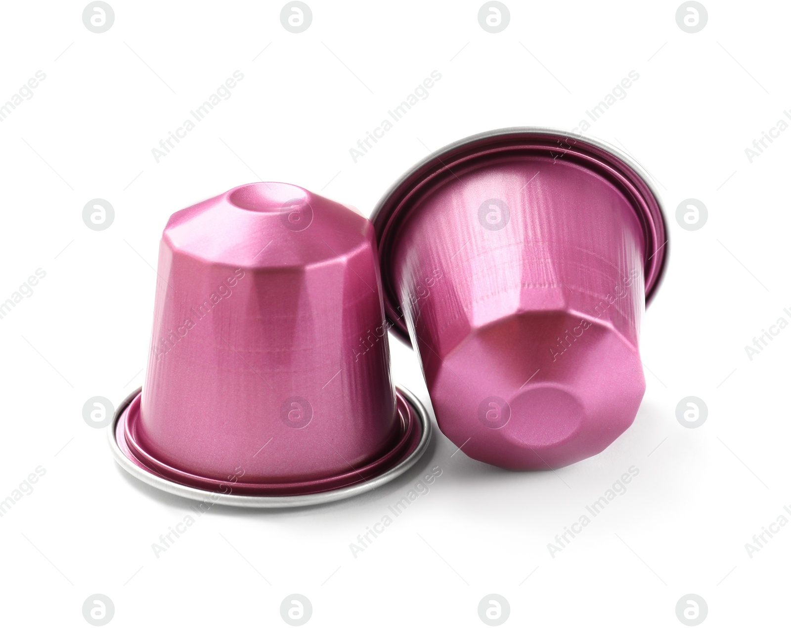 Photo of Two plastic coffee capsules isolated on white