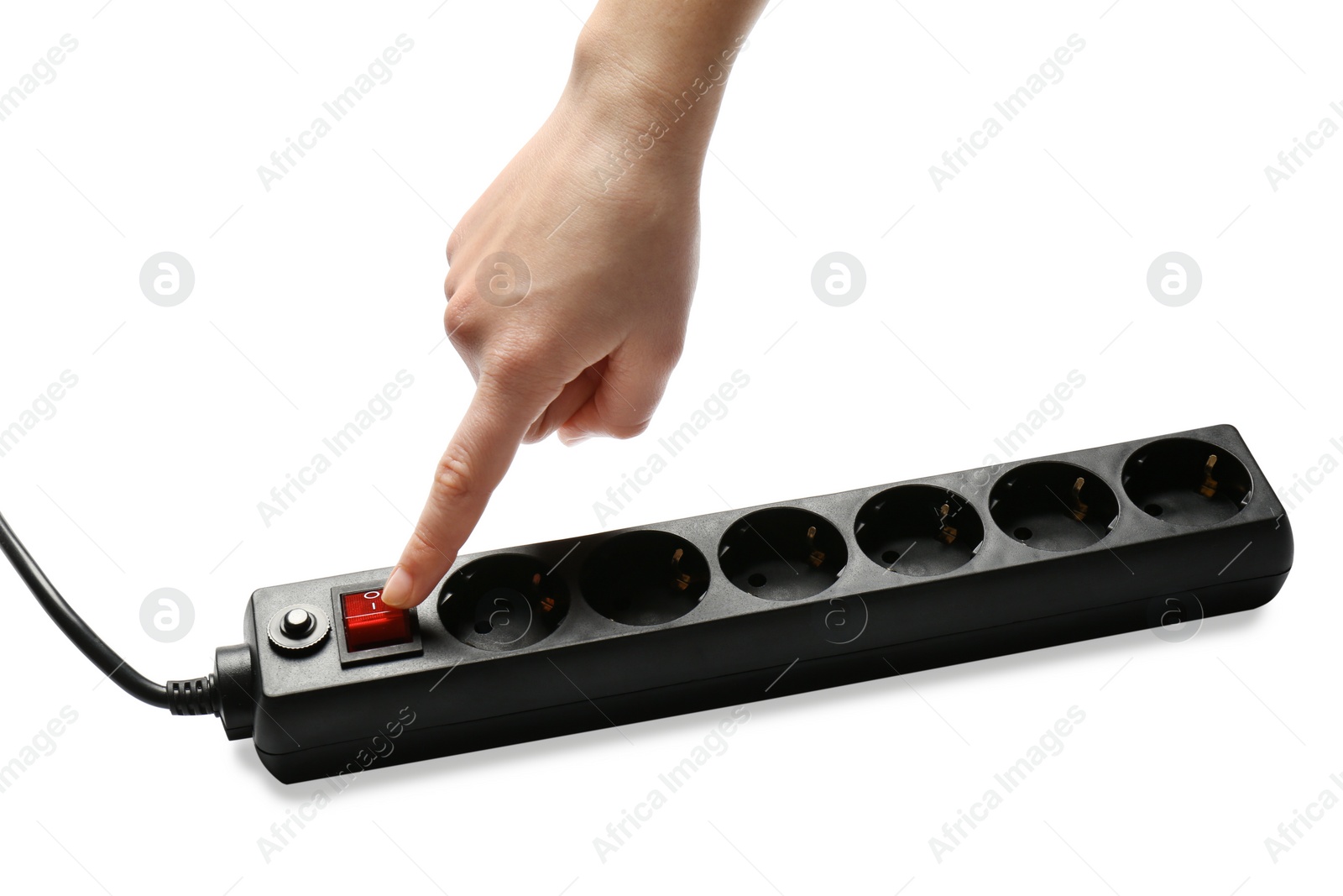 Photo of Woman pressing power button of extension cord on white background, closeup. Electrician's equipment