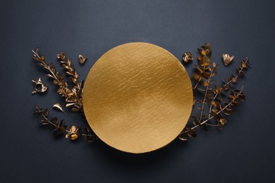 Flat lay composition with golden decor elements. Space for text