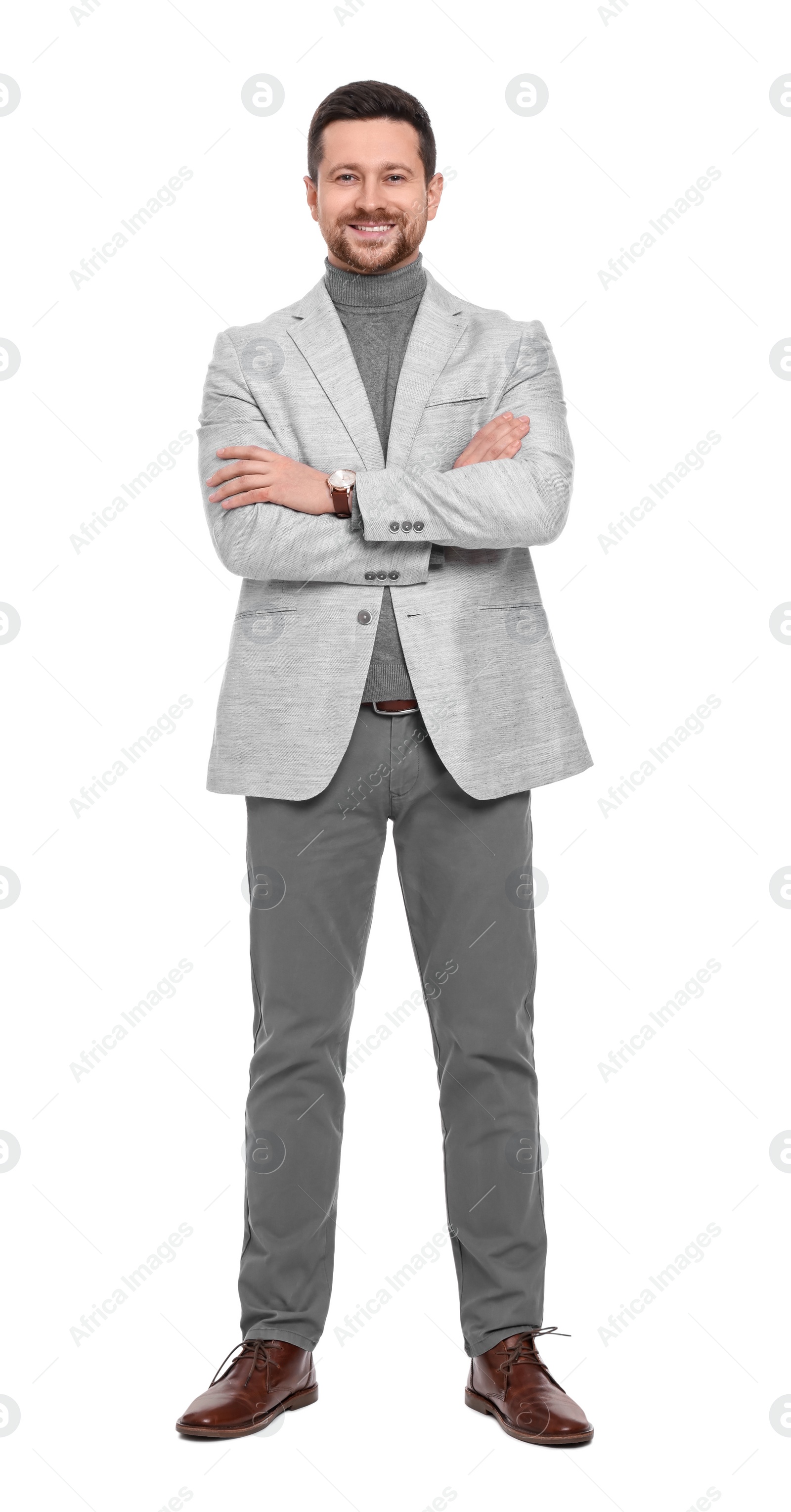 Photo of Handsome bearded businessman in suit on white background