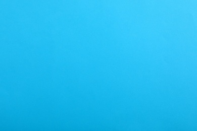 Photo of Abstract blue background, top view. Colorful paper