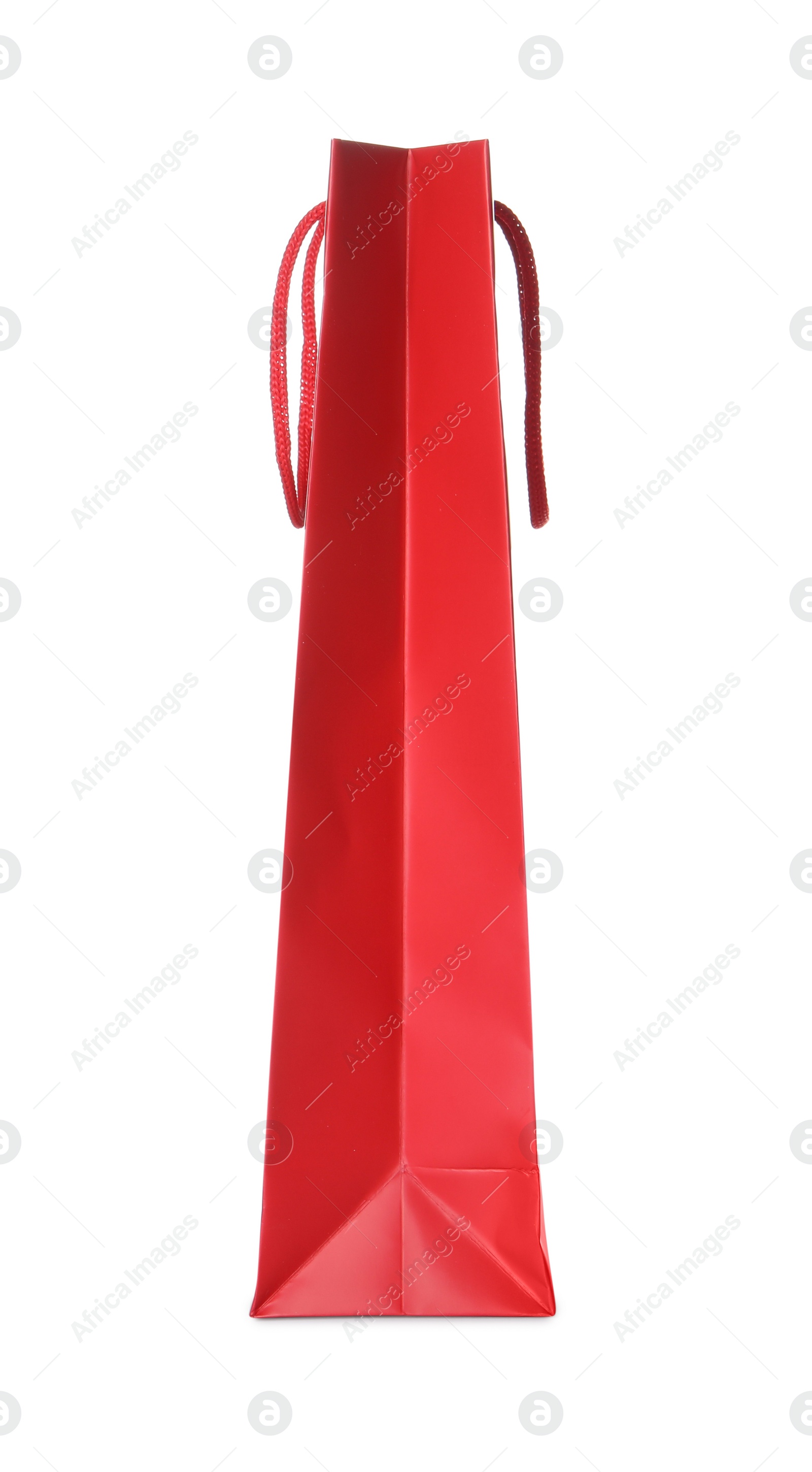 Photo of One red shopping bag isolated on white