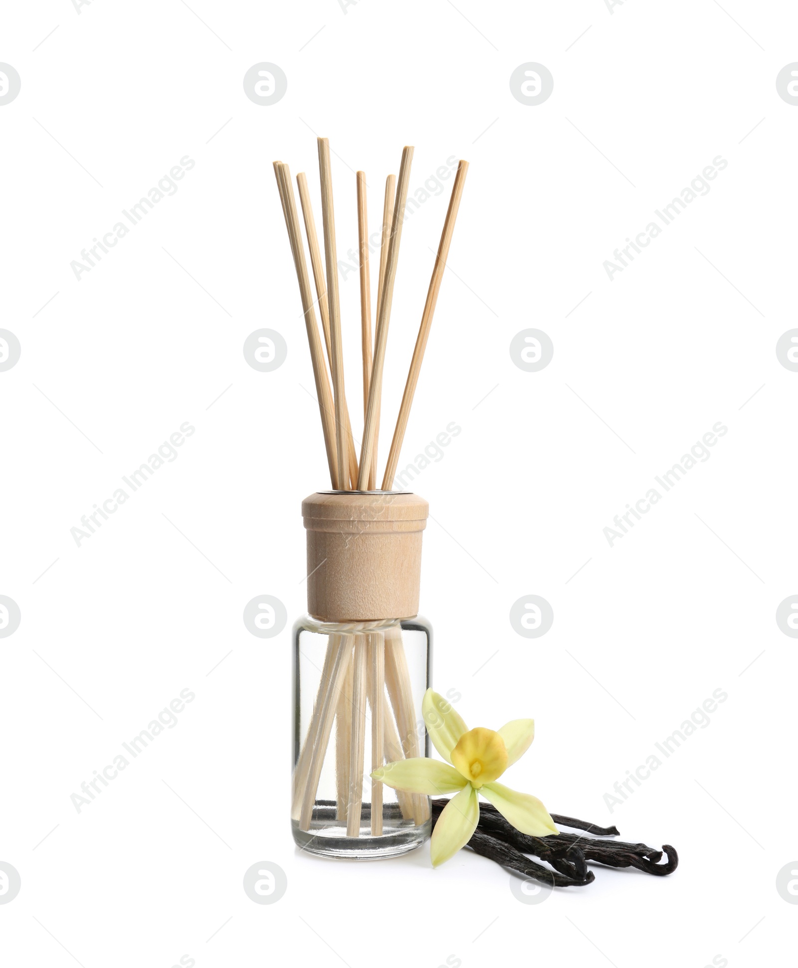 Photo of New reed air freshener, vanilla flower and beans on white background