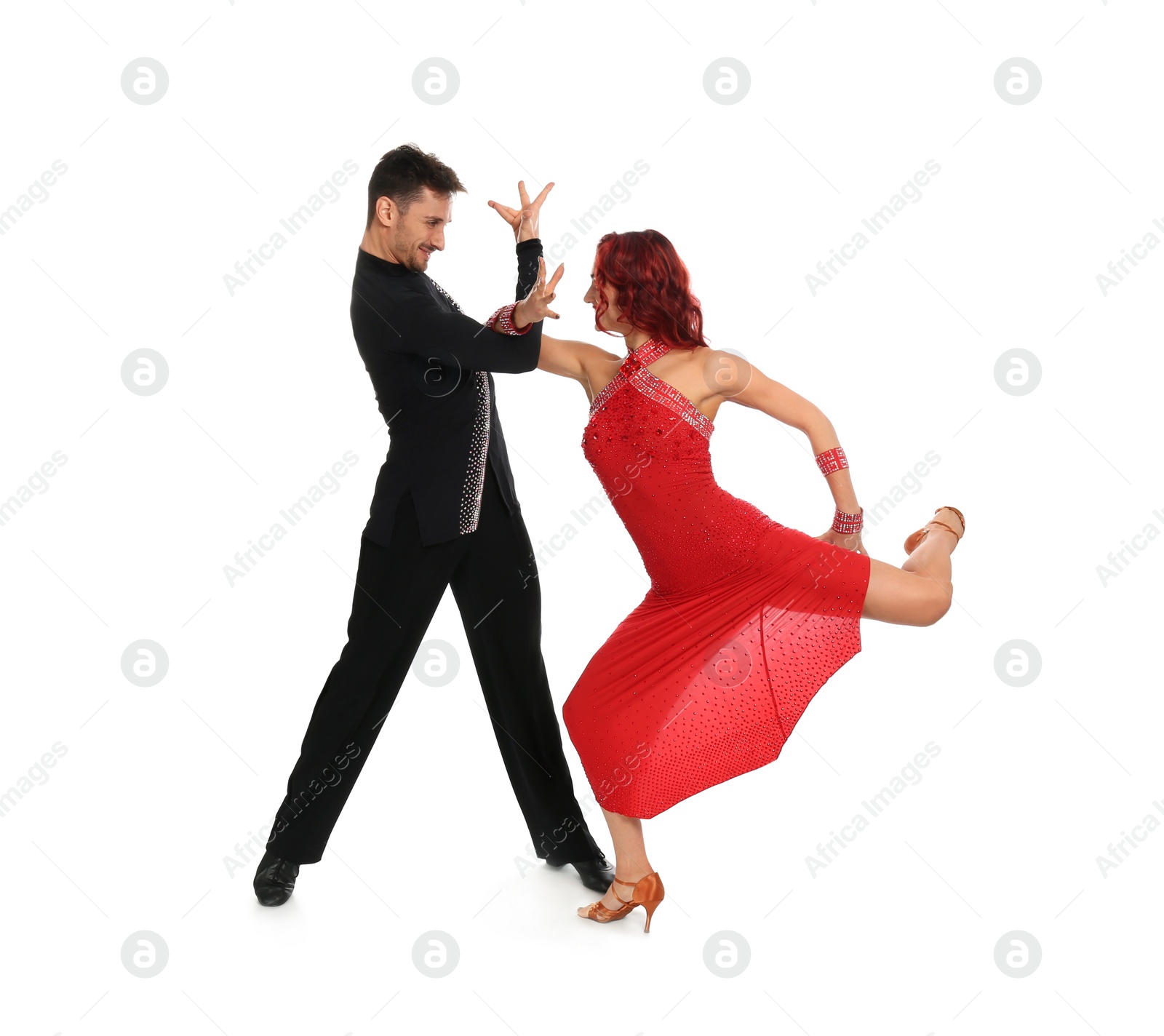 Photo of Passionate young couple dancing on white background