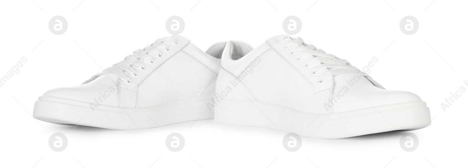 Photo of Pair of stylish sneakers isolated on white