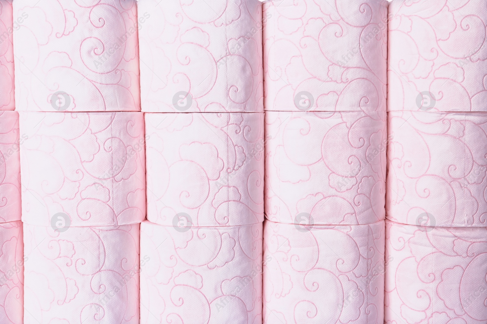 Photo of Many rolls of toilet paper as background. Personal hygiene