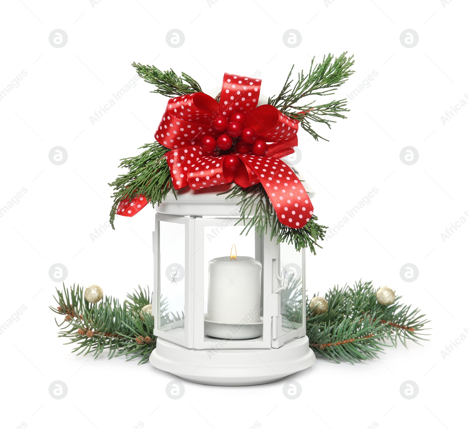 Photo of Decorative Christmas lantern with candle and fir branches on white background