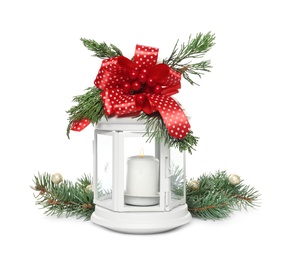 Photo of Decorative Christmas lantern with candle and fir branches on white background