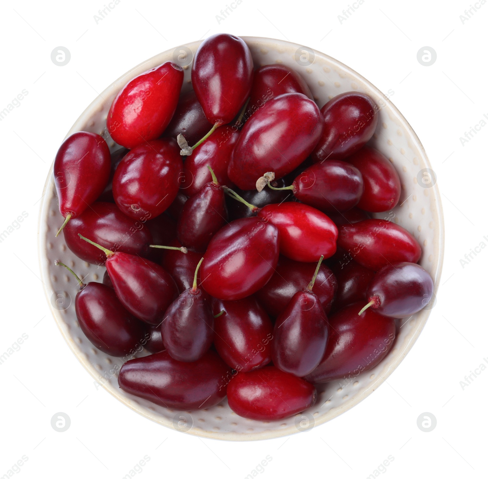 Photo of Fresh ripe dogwood berries in bowl on white background, top view