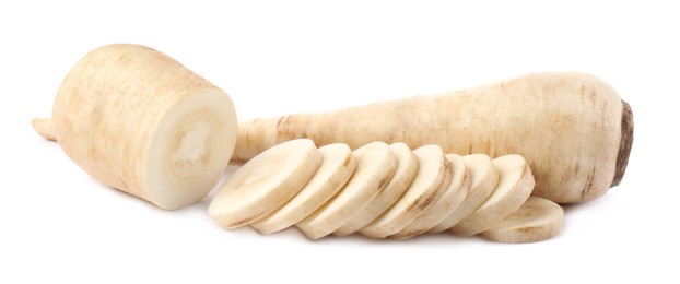 Tasty fresh ripe parsnips on white background