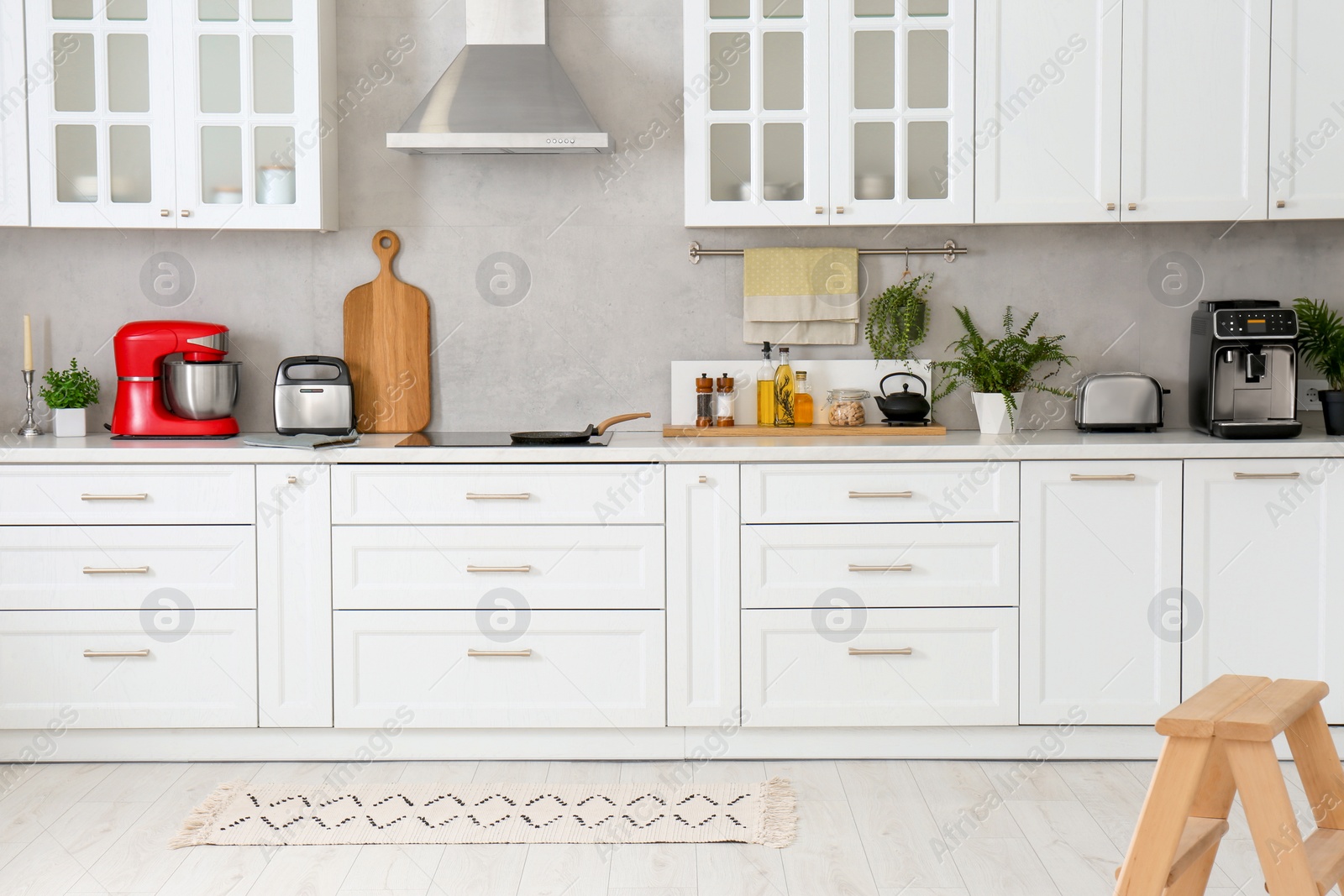 Photo of Beautiful kitchen interior with stylish modern furniture