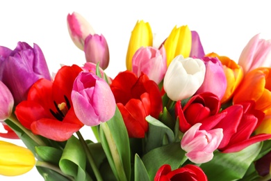 Beautiful bouquet of bright tulip flowers on light background, closeup