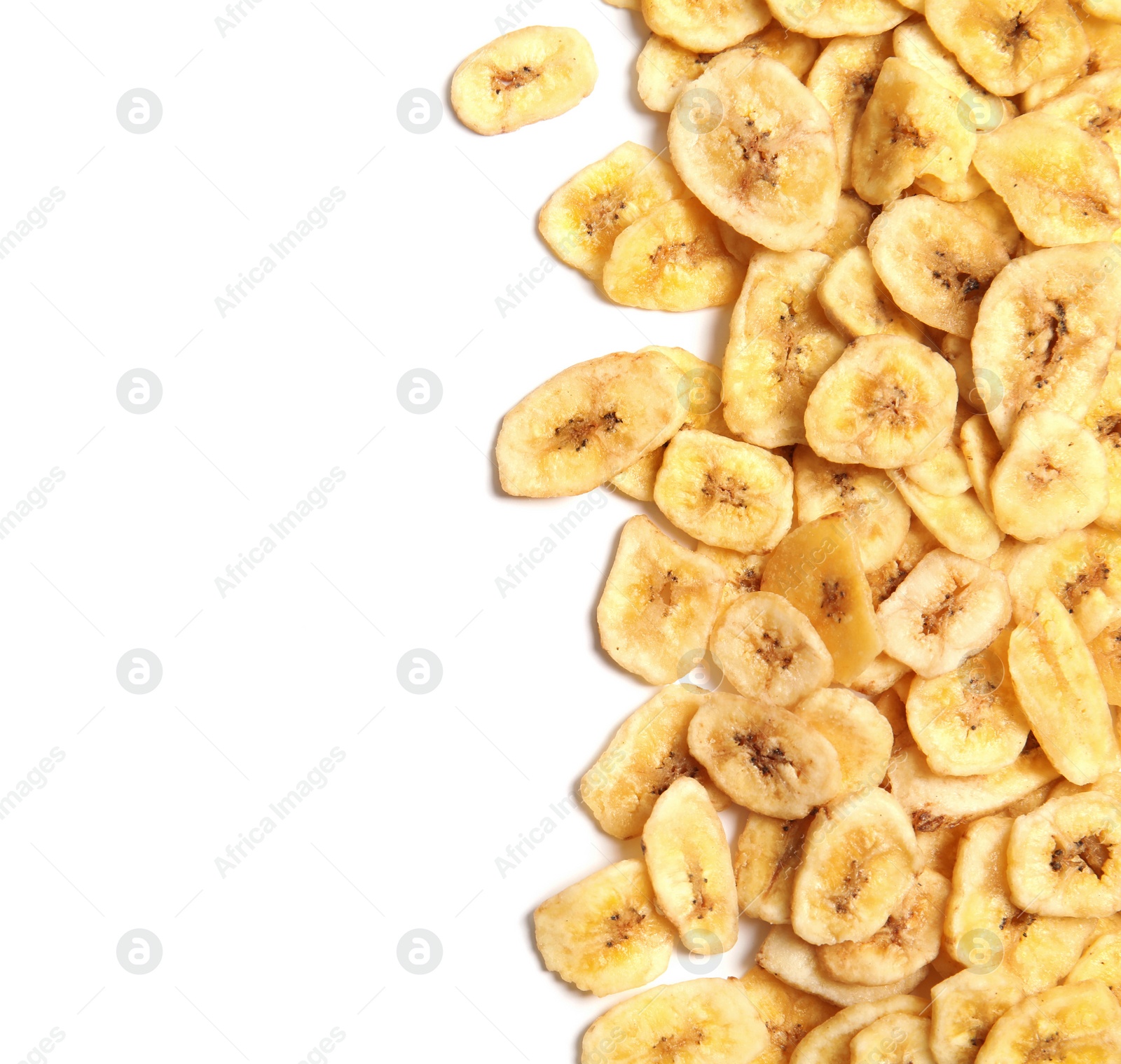 Photo of Tasty banana slices on white background, top view with space for text. Dried fruit as healthy snack