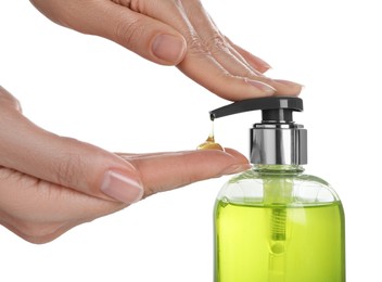 Photo of Woman using liquid soap dispenser on white background, closeup