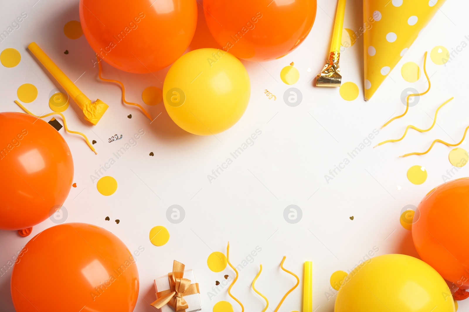 Photo of Flat lay composition with air balloons and space for text on white background