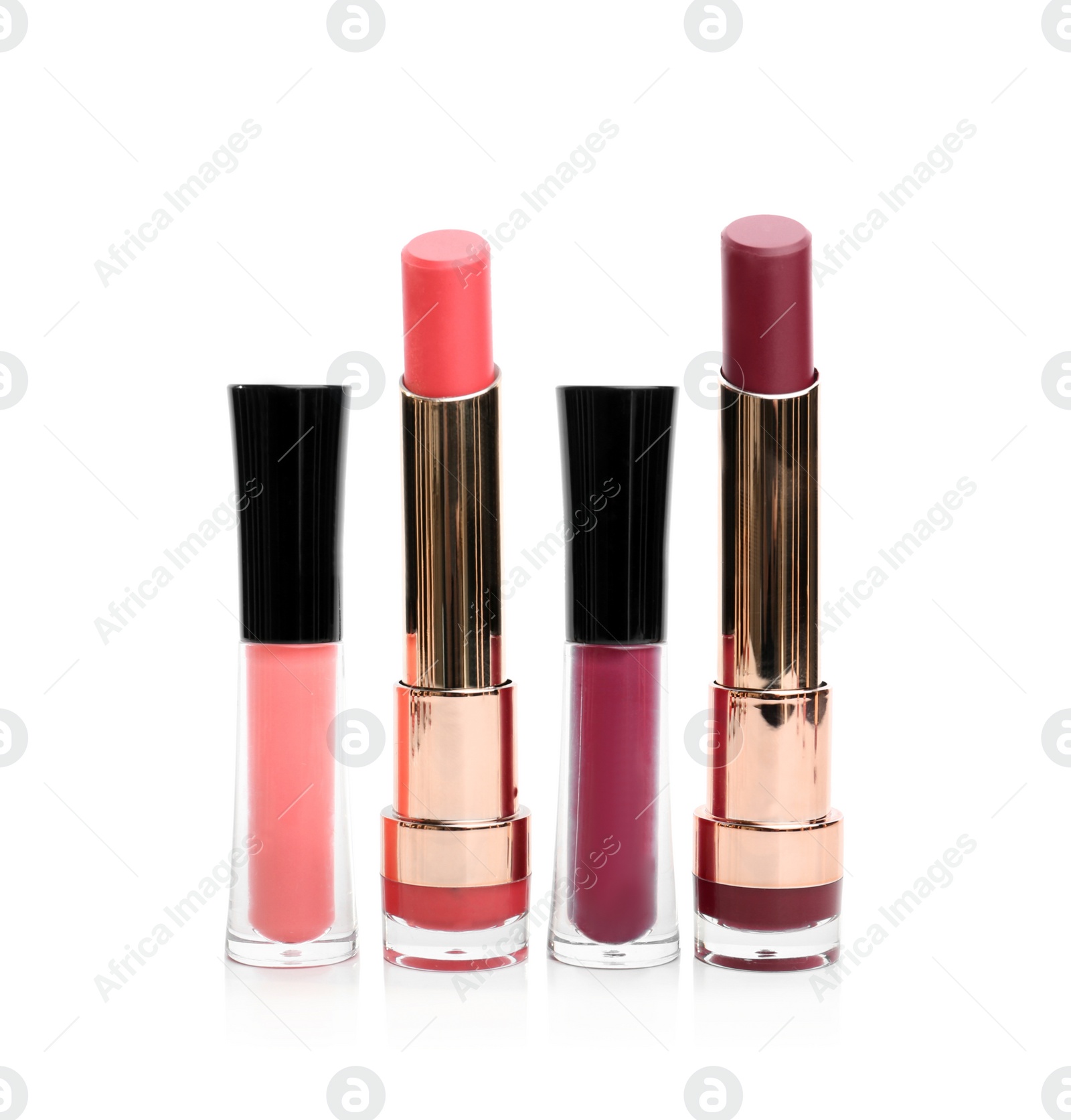 Photo of Many different stylish lipsticks on white background