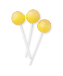 Photo of Many sweet yellow lollipops isolated on white, top view