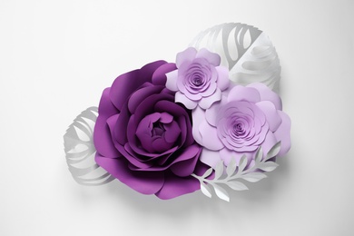 Different beautiful flowers and leaves made of paper on white background, top view