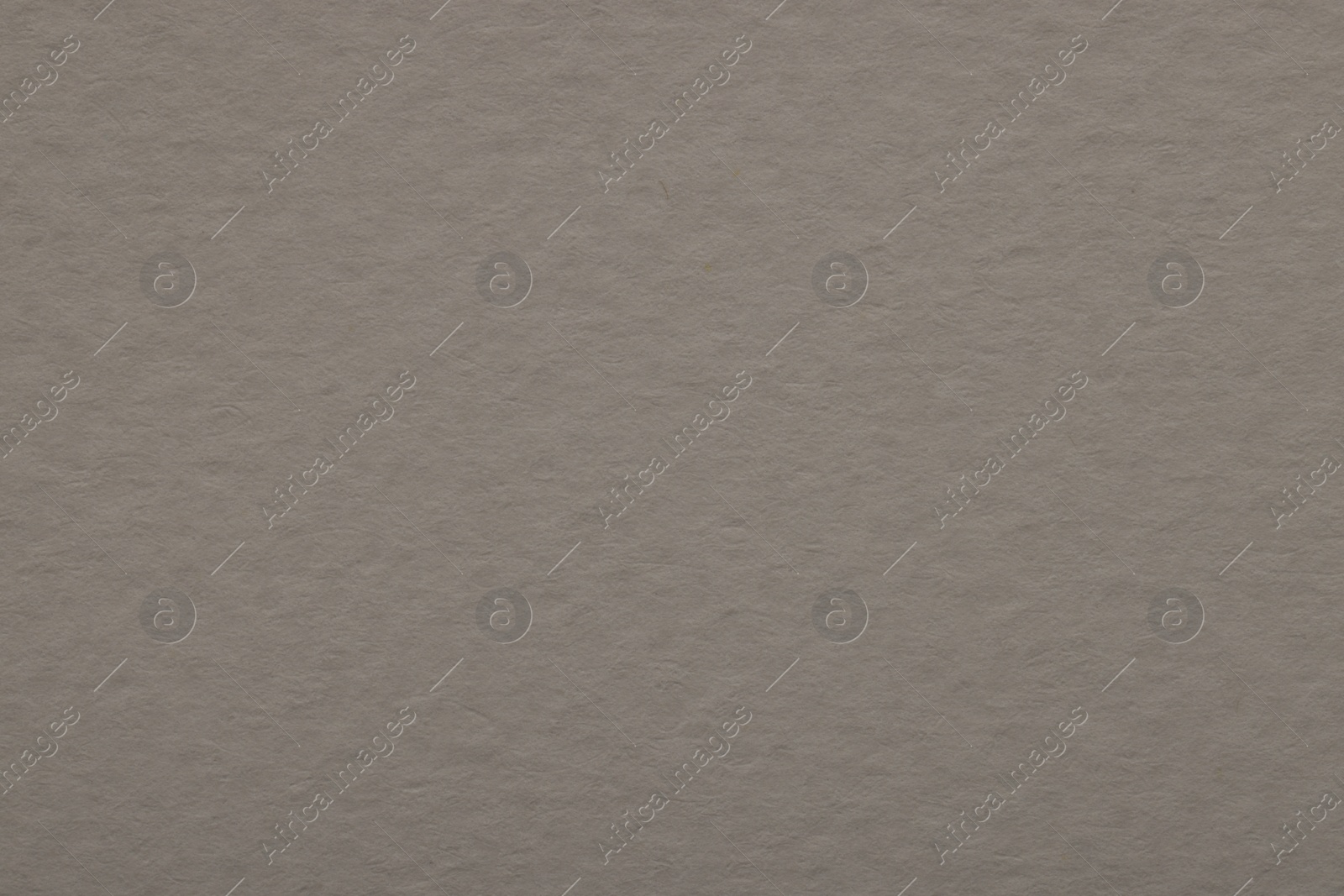 Photo of Texture of light grey paper sheet as background, top view