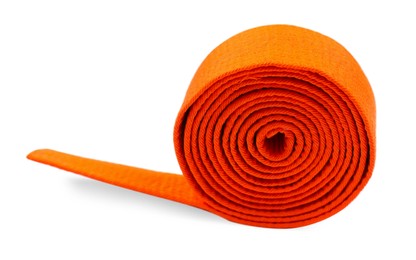 Photo of Orange karate belt isolated on white. Martial arts uniform