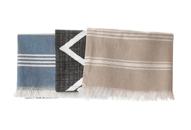 Photo of Kitchen towels with different patterns hanging on white background