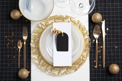 Photo of Elegant table setting on light background, top view. Christmas celebration