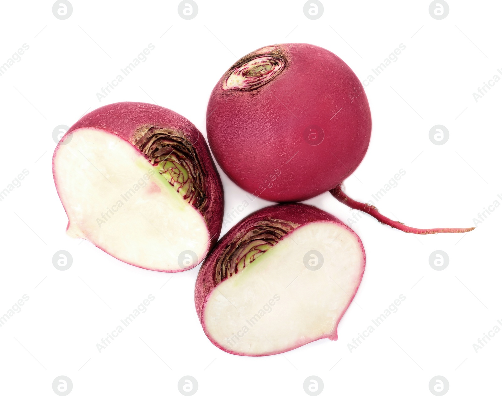 Photo of Cut and whole fresh ripe turnips on white background, top view