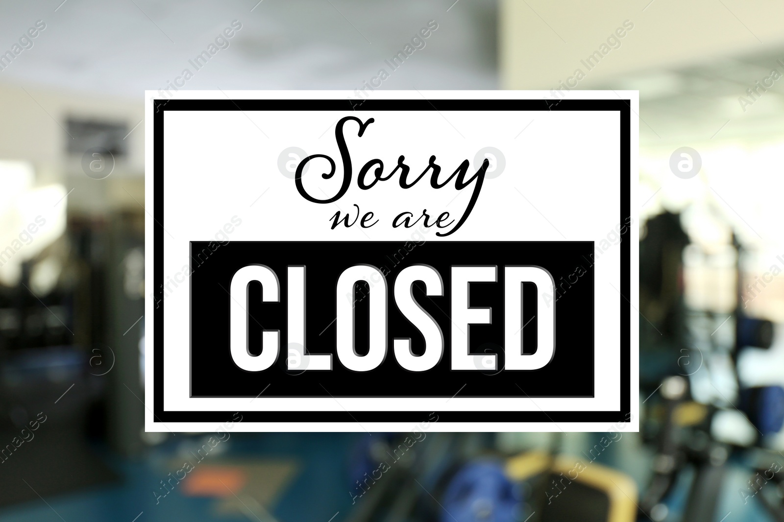 Image of Sorry we are closed sign against blurred background