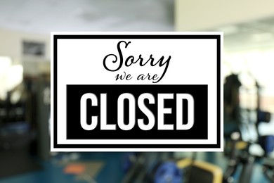 Image of Sorry we are closed sign against blurred background