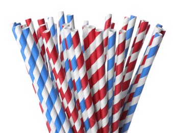 Photo of Striped paper cocktail tubes on white background