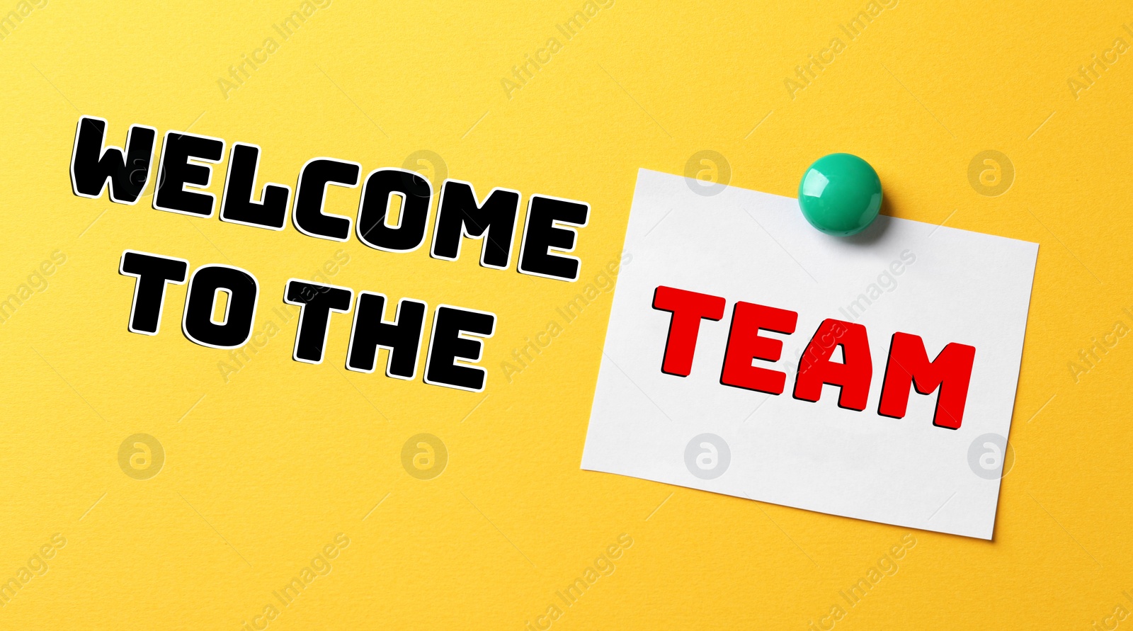 Image of Welcome to the team. Paper note and text on yellow background