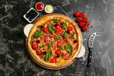 Photo of Flat lay composition with tasty homemade pizza on table