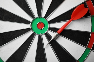 Red arrow on dart board, top view