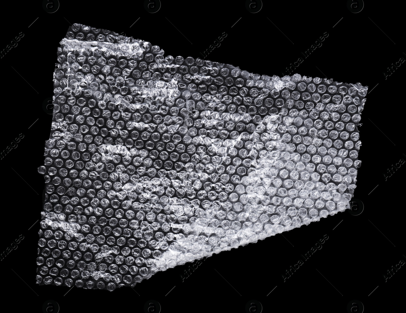 Photo of Transparent bubble wrap on black background, top view