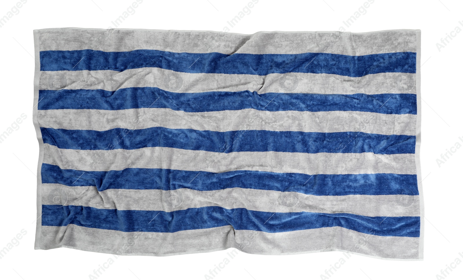 Photo of Crumpled striped beach towel isolated on white, top view