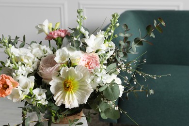 Photo of Beautiful bouquet of different fresh flowers indoors, closeup